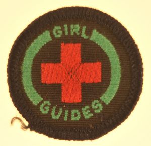 guide-interest-badge-first-aid-pre-1990-green-border-red-cross