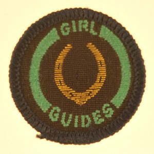 guide-interest-badge-horse-woman-green-border