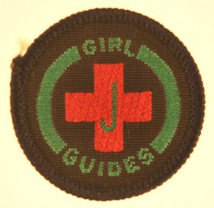 guide-interest-badge-junior-first-aid-pre-1994-green-border-red-cross